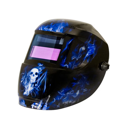 Auto-darkening welding helmet with blue flames and skull graphic design